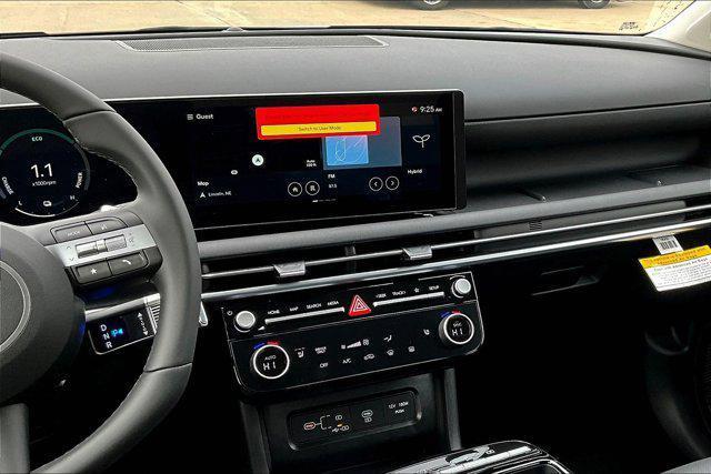 Photo of 2025 Black Hyundai TUCSON Hybrid