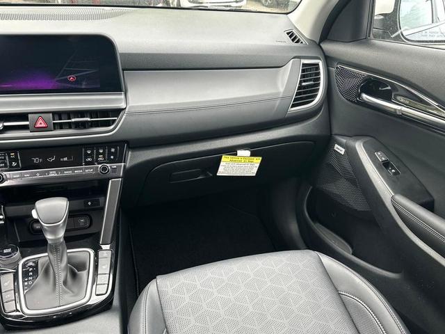 Photo of 2024 Dark Ocean Blue/White Roof Kia Seltos