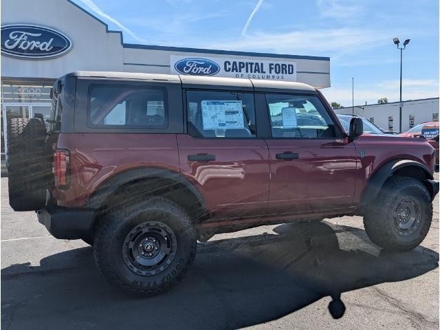 Photo of 2025 Ruby Red Metallic Tinted Clearcoat Ford Bronco