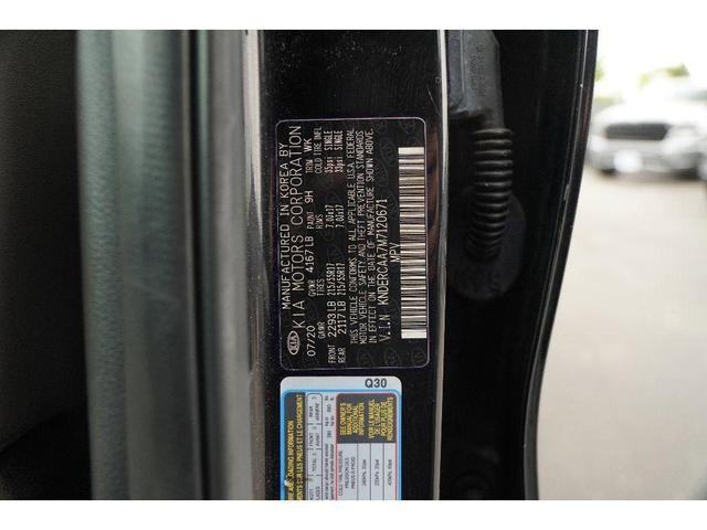 Photo of 2021 Cherry Black Kia Seltos