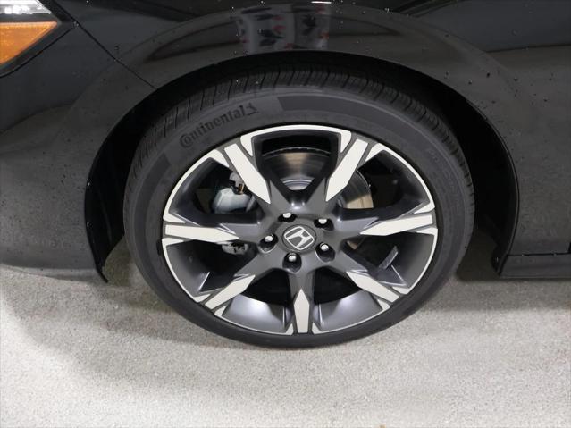 Photo of 2025 Boost Blue Pearl Honda Civic Hybrid