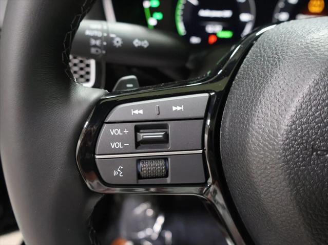 Photo of 2025 Boost Blue Pearl Honda Civic Hybrid