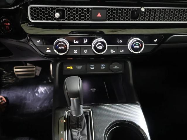 Photo of 2025 Boost Blue Pearl Honda Civic Hybrid