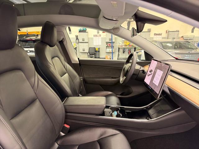Photo of 2021 Pearl White Multi-Coat Tesla Model Y