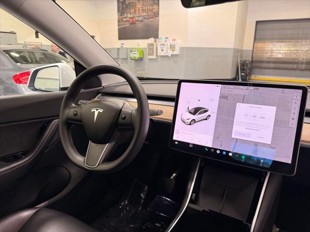 Photo of 2021 Pearl White Multi-Coat Tesla Model Y