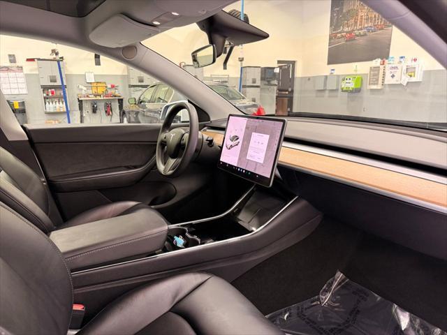 Photo of 2021 Pearl White Multi-Coat Tesla Model Y