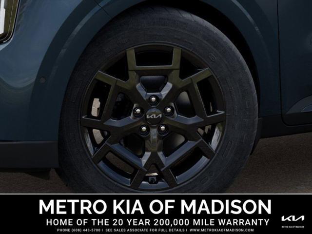 Photo of 2026 Astra Blue Kia Carnival Hybrid