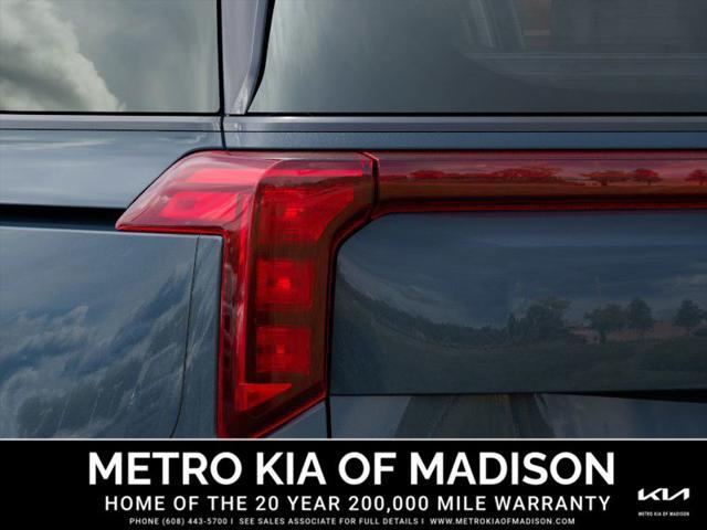 Photo of 2026 Astra Blue Kia Carnival Hybrid