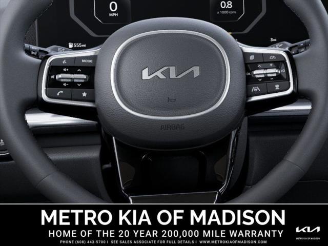 Photo of 2026 Astra Blue Kia Carnival Hybrid