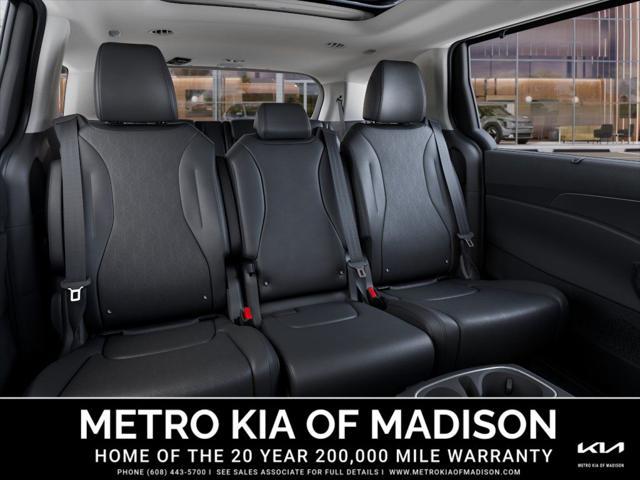 Photo of 2026 Astra Blue Kia Carnival Hybrid