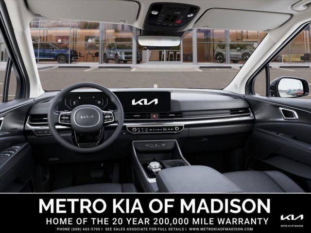 Photo of 2026 Astra Blue Kia Carnival Hybrid
