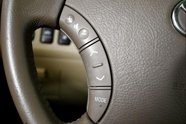 Photo of 2006 Sonora Gold Pearl Toyota Highlander Hybrid