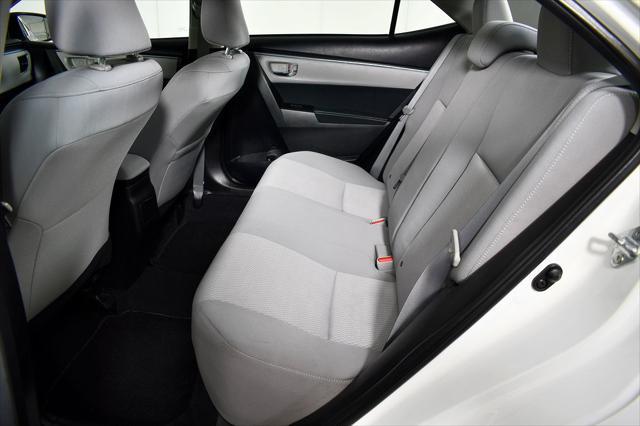 Photo of 2014 Super White Toyota Corolla
