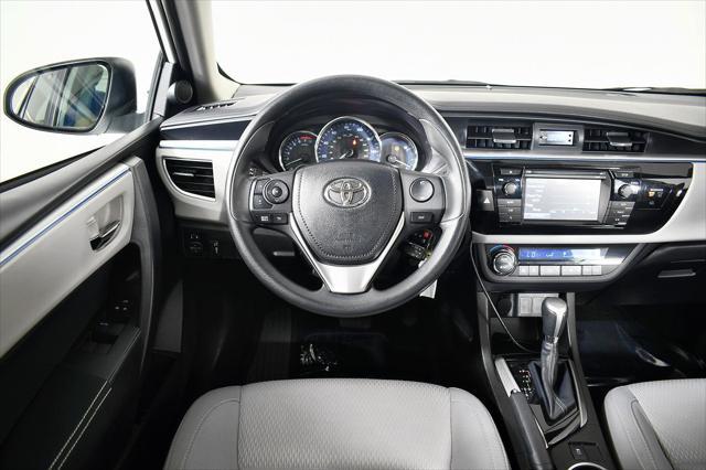 Photo of 2014 Super White Toyota Corolla