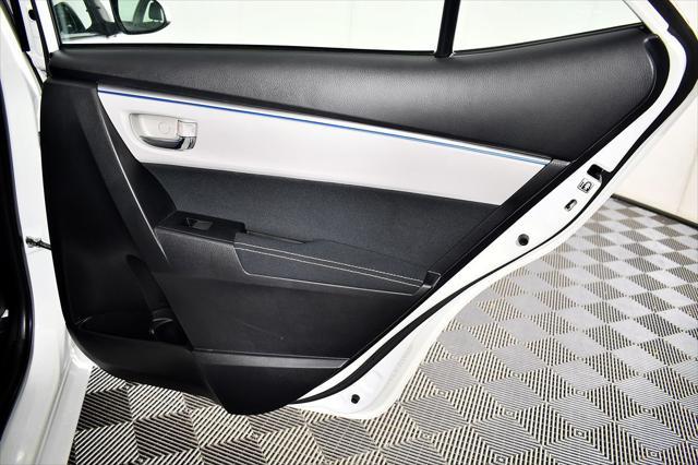 Photo of 2014 Super White Toyota Corolla