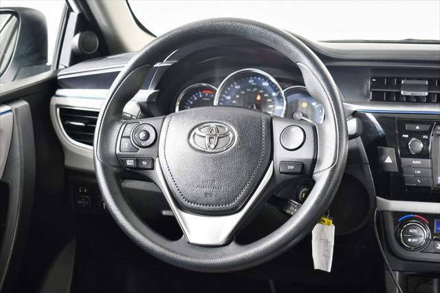 Photo of 2014 Super White Toyota Corolla