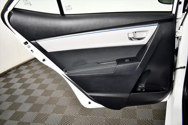 Photo of 2014 Super White Toyota Corolla