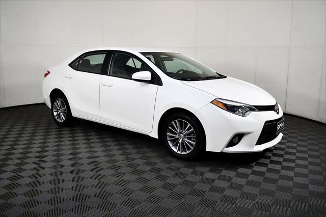 Photo of 2014 Super White Toyota Corolla