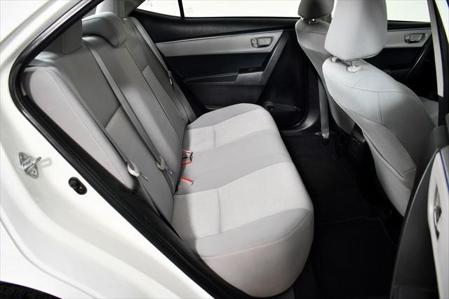 Photo of 2014 Super White Toyota Corolla