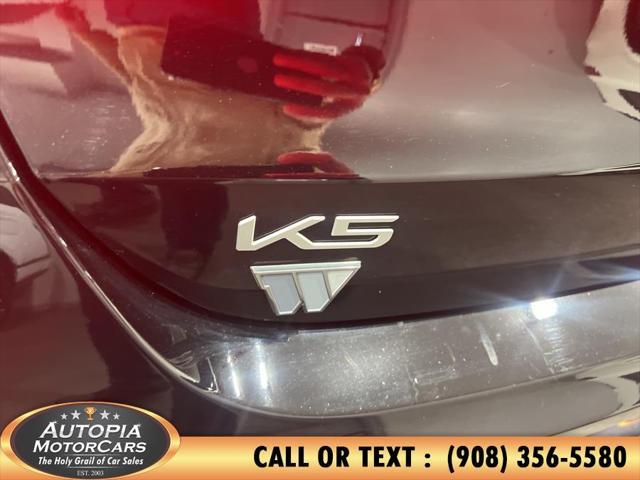 Photo of 2023 Ebony Black Kia K5