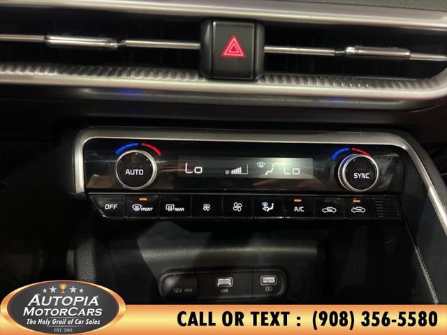Photo of 2023 Ebony Black Kia K5