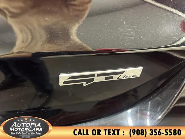 Photo of 2023 Ebony Black Kia K5