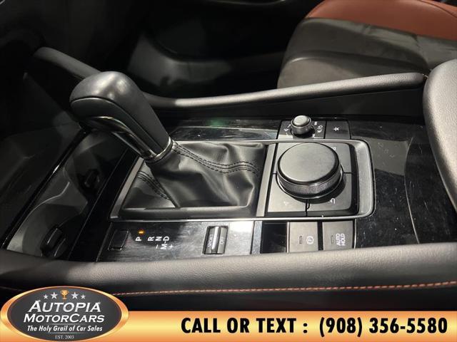 Photo of 2024 Zircon Sand Metallic Mazda Mazda3