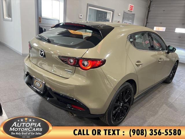 Photo of 2024 Zircon Sand Metallic Mazda Mazda3