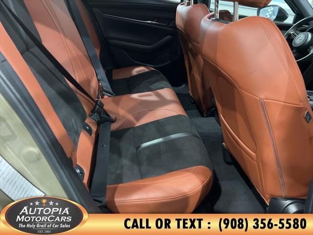Photo of 2024 Zircon Sand Metallic Mazda Mazda3