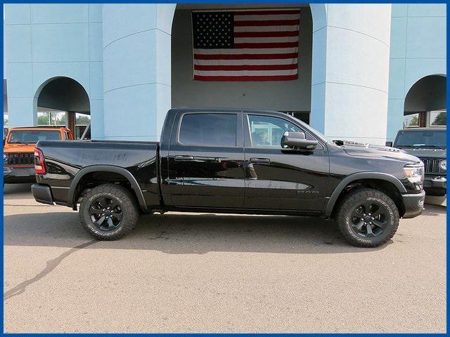 Photo of 2021 Diamond Black Crystal Pearlcoat RAM 1500