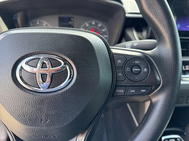 Photo of 2024 Jet Black Toyota Corolla Hybrid