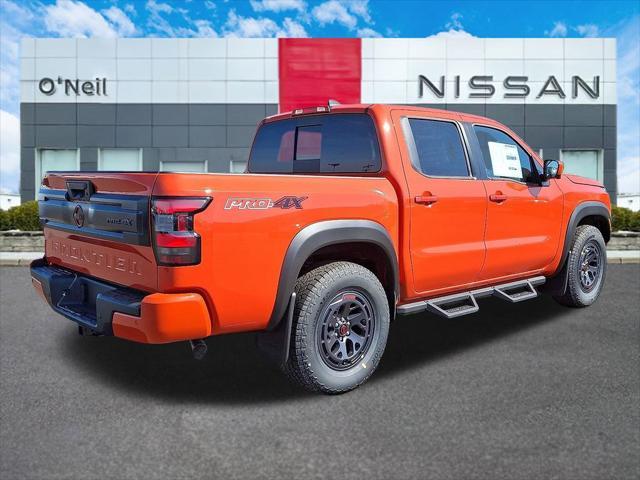 Photo of 2025 Afterburn Orange Nissan Frontier