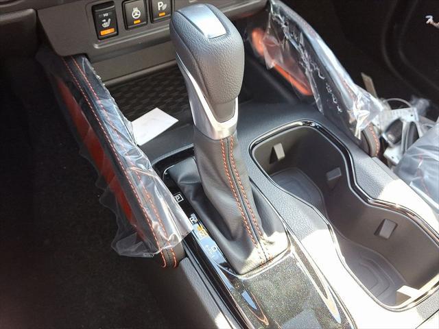 Photo of 2025 Afterburn Orange Nissan Frontier