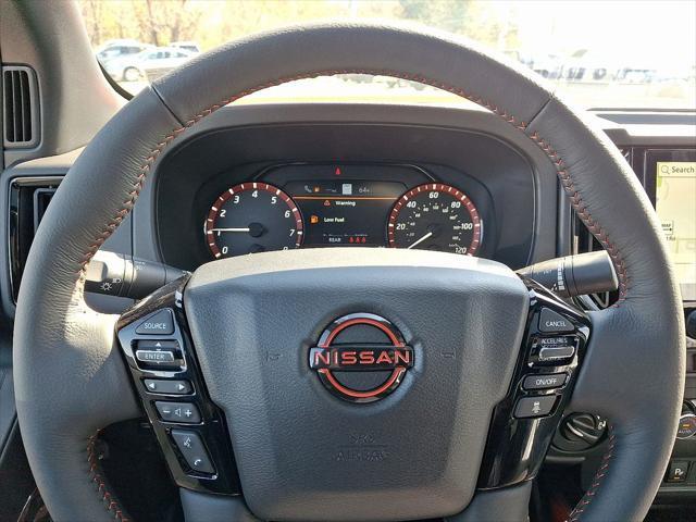 Photo of 2025 Afterburn Orange Nissan Frontier