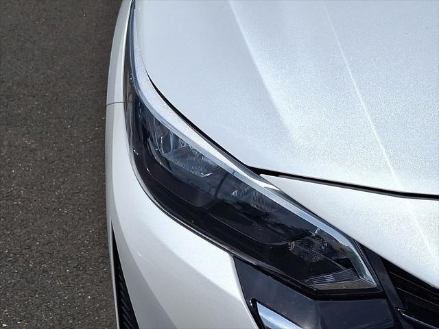 Photo of 2025 Aspen White Tricoat Nissan Sentra