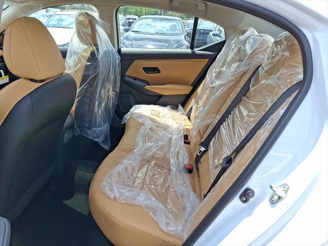 Photo of 2025 Aspen White Tricoat Nissan Sentra