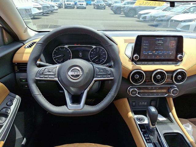 Photo of 2025 Aspen White Tricoat Nissan Sentra