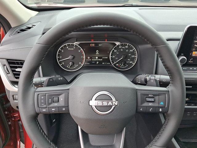 Photo of 2026 Scarlet Ember Tintcoat Nissan Rogue