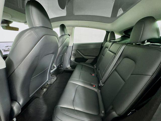 Photo of 2023 Pearl White Multi-Coat Tesla Model Y
