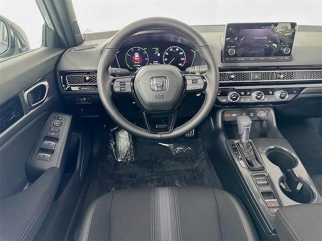 Photo of 2025 Platinum White Pearl Honda Civic Hybrid