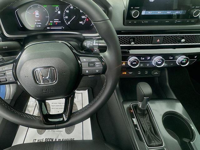 Photo of 2026 Crystal Black Pearl Honda Civic Hybrid
