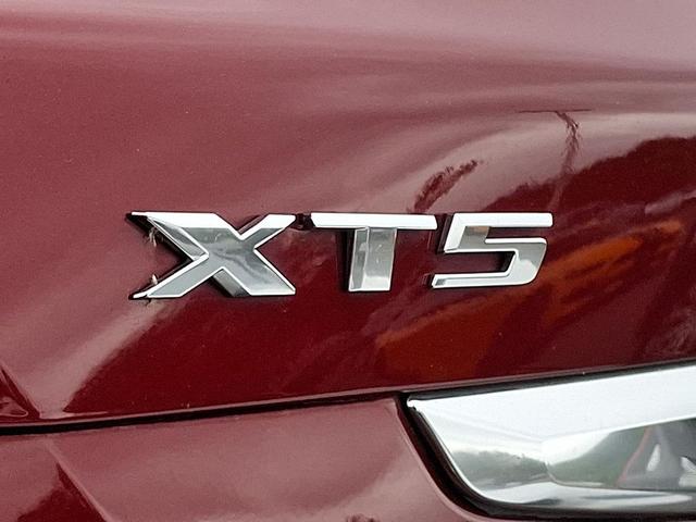 Photo of 2017 Red Passion Tintcoat Cadillac XT5
