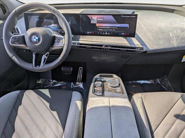 Photo of 2026 Arctic Race Blue Metallic BMW iX