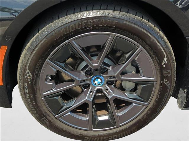 Photo of 2024 Black Sapphire Metallic BMW i4 Gran Coupe