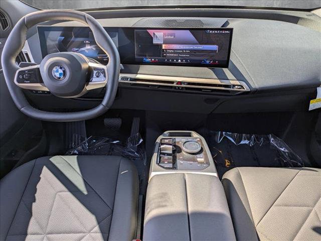 Photo of 2026 Arctic Race Blue Metallic BMW iX