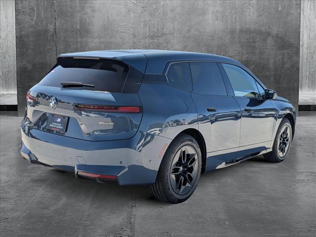 Photo of 2026 Arctic Race Blue Metallic BMW iX