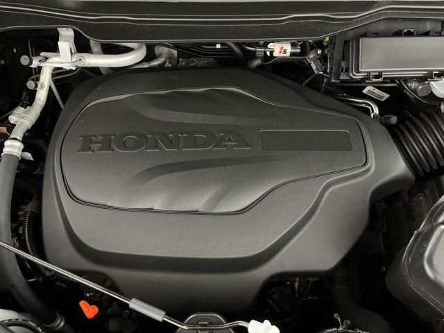 Photo of 2022 Crystal Black Pearl Honda Passport