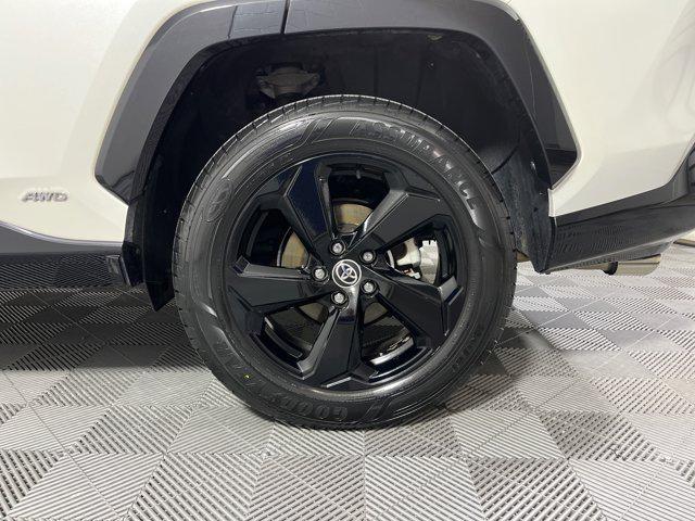 Photo of 2021 Blizzard Pearl/Midnight Black Metallic Toyota RAV4 Hybrid