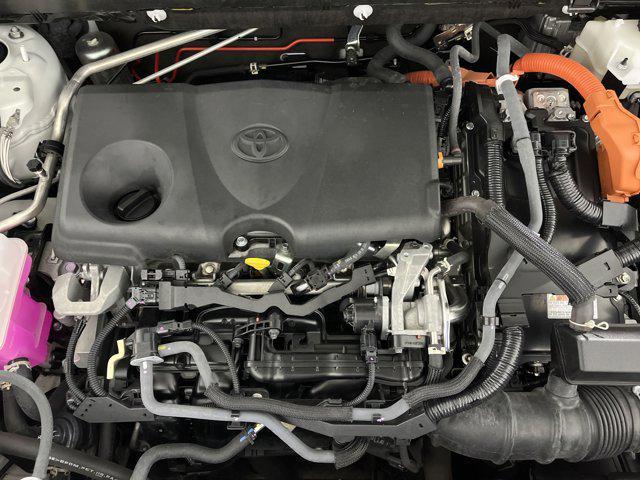 Photo of 2021 Blizzard Pearl/Midnight Black Metallic Toyota RAV4 Hybrid