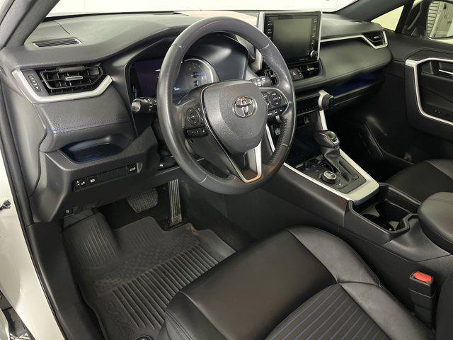 Photo of 2021 Blizzard Pearl/Midnight Black Metallic Toyota RAV4 Hybrid
